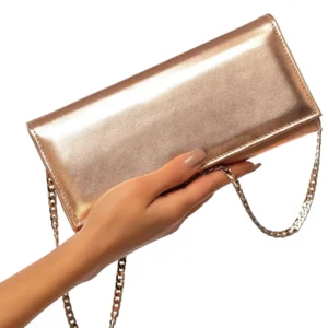 Sac à main rose gold en cuir Mautassin, accessoire glamour et fonctionnel.